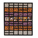 A fun blocked Halloween quilt with white, orange, and purple fabrics on a white background