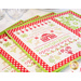 Placemats featuring a Christmas themed cross stitch sample panel print.