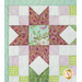 Close up of sawtooth star and checker design in pastel green and purple fabrics.