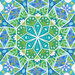 A geometric fabric swatch with green, blue, teal, and white geometric shapes
