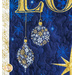 Christmas Joy Quilt Kit featuring a snowflake filled ornaments on blue and gold fabric.