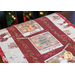 A festive tablecloth featuring Christmas designs, including a tree, gingerbread, and holiday greetings.