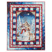 Panel quilt of a winter scene including a snowy cabin, a snowman, and a small deer.