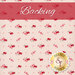 A swatch of pale pink fabric with small red and pink flowers clusters all over. A red banner at the top reads 