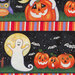 A close up of a the fabric showing a smiling ghost in front of a moon, jack-o-lanterns, bats, and colorful stripes