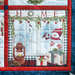 A cozy quilt square featuring a winter scene with a snowman, lantern, gifts, and HOME text.