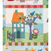 Quilt block featuring a teal house with orange roof near a tree with a birds nest and birds.