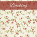 Cream fabric with vining pink roses with yellow flower accents