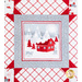Close up of a block featuring a woodland scene with a cabin in red accents and a gray border