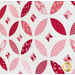 angled view of orange blossoms quilt hanging on a wall in pink, red and white fabrics