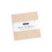 Photo of Moda's back to basics charm pack with a label on the front
