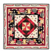 Geometric small quilt featuring Coffee Always fabrics in red, black and cream, isolated on a white background