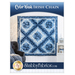 Front cover of Color Wash Irish Chain Quilt Pattern featuring a finished quilt hanging on a wall in the Blizzard Blues collection