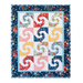 Blue, white, yellow, and red mini quilt featuring blocks with a swirling design and a dark blue border isolated on a white background