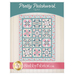 front cover of quilt pattern, with the Pretty Patchwork Quilt title at the top, patchwork quilt in aqua and pink florals in the center, and Shabby Fabrics logo at the bottom