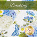 Fabric with large floral print with blue and white flower clusters and a blue butterfly with a yellow banner at the top that reads 