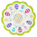 A round scalloped table topper with decorated easter eggs on a white background with a bright green border and hand embroidered details isolated on a white background