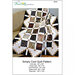 Front of the simply cool pattern by pleasant valley creations, showing a finished quilt in black, white, and brown