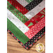 Close up of a festive tree skirt made with red, green, black, and white fabric strips
