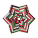 Isolated image of a festive tree skirt made with red, green, black, and white fabric strips on a white background