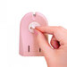 A pink oval tool that holds a circular rotary cutter blade, with a small dial on the front against a white background