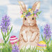 Close up image of panel featuring a bunny with a flower crown, flowers, and easter eggs in grass on a light blue background 