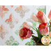 Photo of pink and coral colored tulips and roses with the trellis quilt hanging in the background