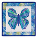 Photo of a blue and green butterfly made with foundation paper piecing techniques, isolated on a white background