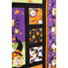 Close up of quilt blocks made with Halloween fabrics with gnomes and jack-o-lanterns