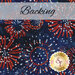 Dark blue batik fabric with red and white fireworks all over with a pale banner at the top that reads: 