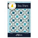 Front of the Sea Stars pattern with a blue and white quilt with star designs on it