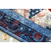 Close up of table runner details showing quilting pattern and patriotic fabrics with fireworkd