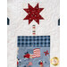 close up photo of quilting detail showing patriotic fabric and the top of a firecracker with a burst shape at the top