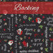 Black fabric with tossed Christmas phrases, birdhouses, snowflakes, and holly with a red banner at the top that reads 