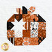Close up photo of a quilt block featuring a patchwork pumpkin made with orange, cream, and black fabrics.
