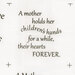 white fabric scan with grateful words related to mothers across it