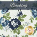 Cream fabric with navy and light blue flowers with green leaves all over with a navy banner at the top with the word 