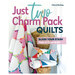 The front cover of the Just Two Charm Pack Quilts book, showcasing two of the finished quilts