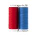 isolated image of two spools of thread in red and blue