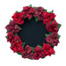 Photo to of the finished Poinsettia Wool Table Topper isolated on a white background.