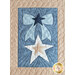close up of a single quilt block showing stitching detail and depicting a light blue bow with a dark blue star above a cream and tan irregular star