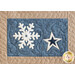 close up of a quilt block showing stitching detail and a large white snowflake with a blue and cream star side by side