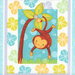 close up of fabric panel featuring a cute monkey hanging upside down from a palm tree on an aqua background with soft flower motifs surrounding it in a gray scalloped border