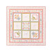 A pastel floral quilt featuring 9 blocks with friendship themes, isolated on a white background