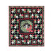 Isolated image of a finished Christmas Eve quilt made with red, green, white, and black fabrics with a large wreath and house in the center, on a white background