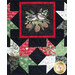 Close up of quilt blocks from the Christmas Eve Quilt showing traditional star designs using red, green, black, and white fabrics, and a panel block showing birds perched amid pinecones.