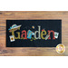 black rectangular table mat on a brown wooden countertop with the word 