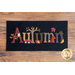 black rectangular table mat with the word 