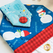 Hanging towel and hot pad for January, featuring snowmen and other winter motifs.