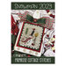 Front cover of the Snowman 2023 pattern booklet featuring a photo of the completed project with title and designer info.